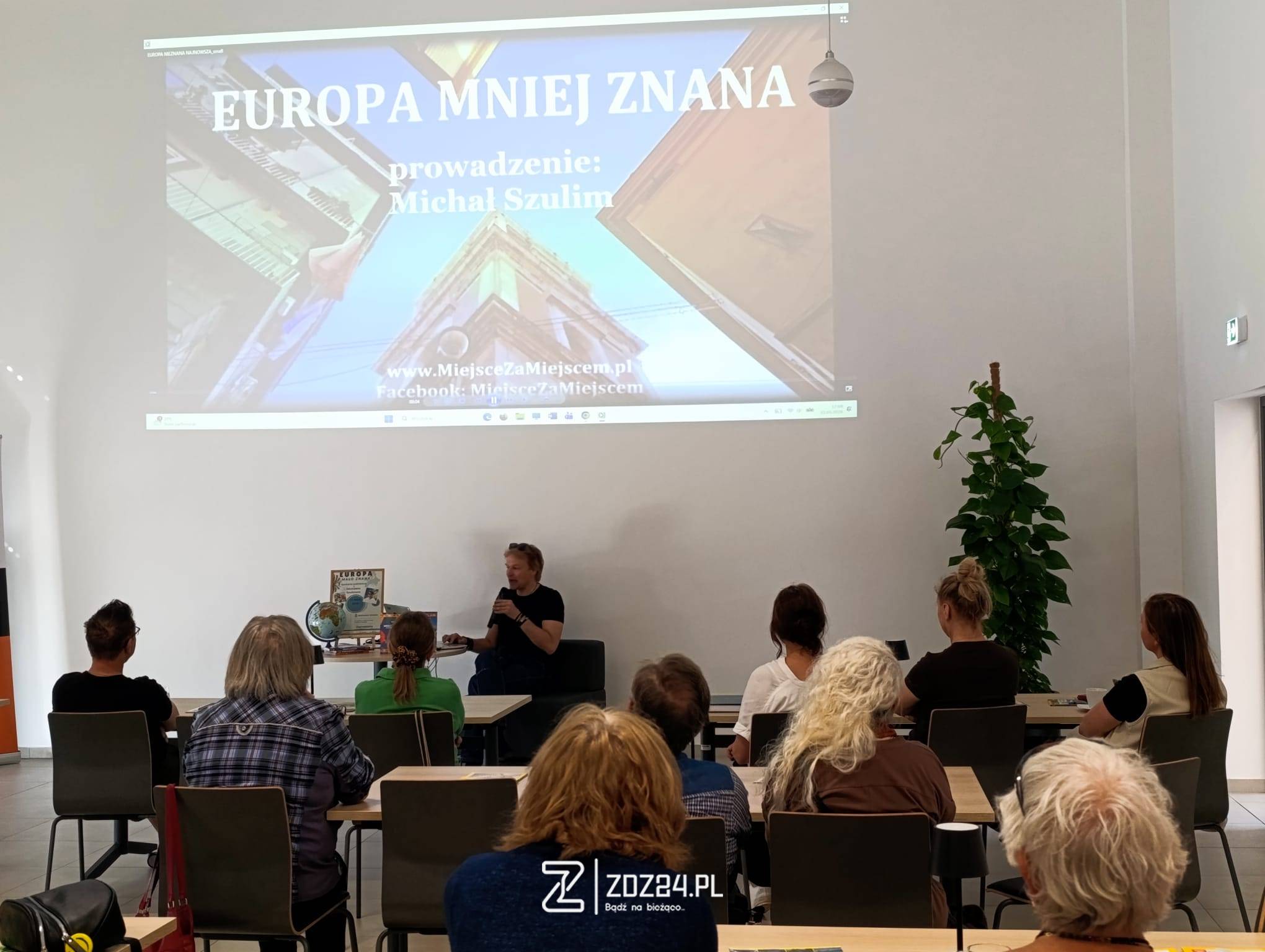 news 2026 06 miejsce za miejscem spotkanie z podroznikiem michalem szulimem w bibliotece w zdzieszowicach 01
