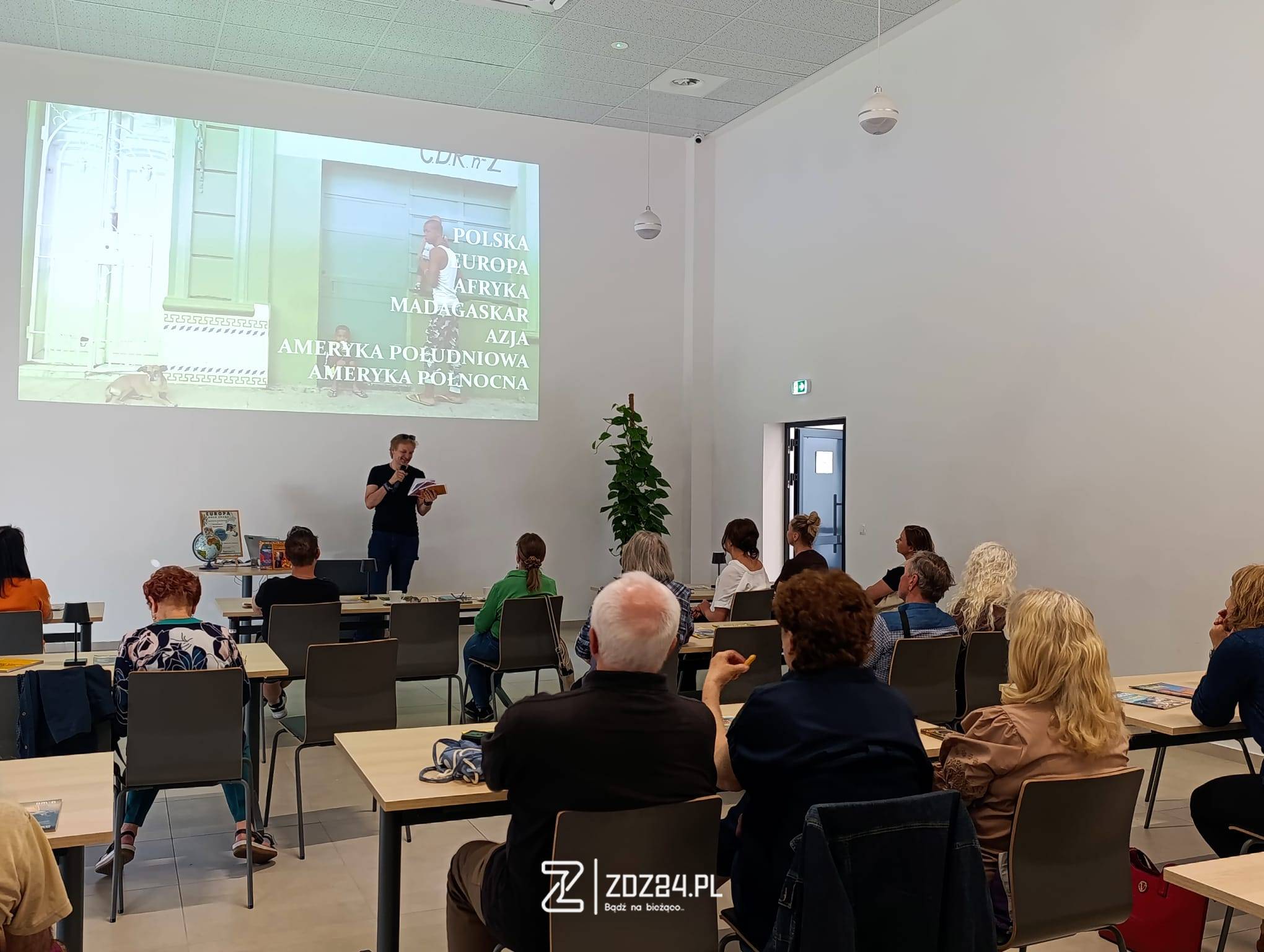 news 2026 06 miejsce za miejscem spotkanie z podroznikiem michalem szulimem w bibliotece w zdzieszowicach 04